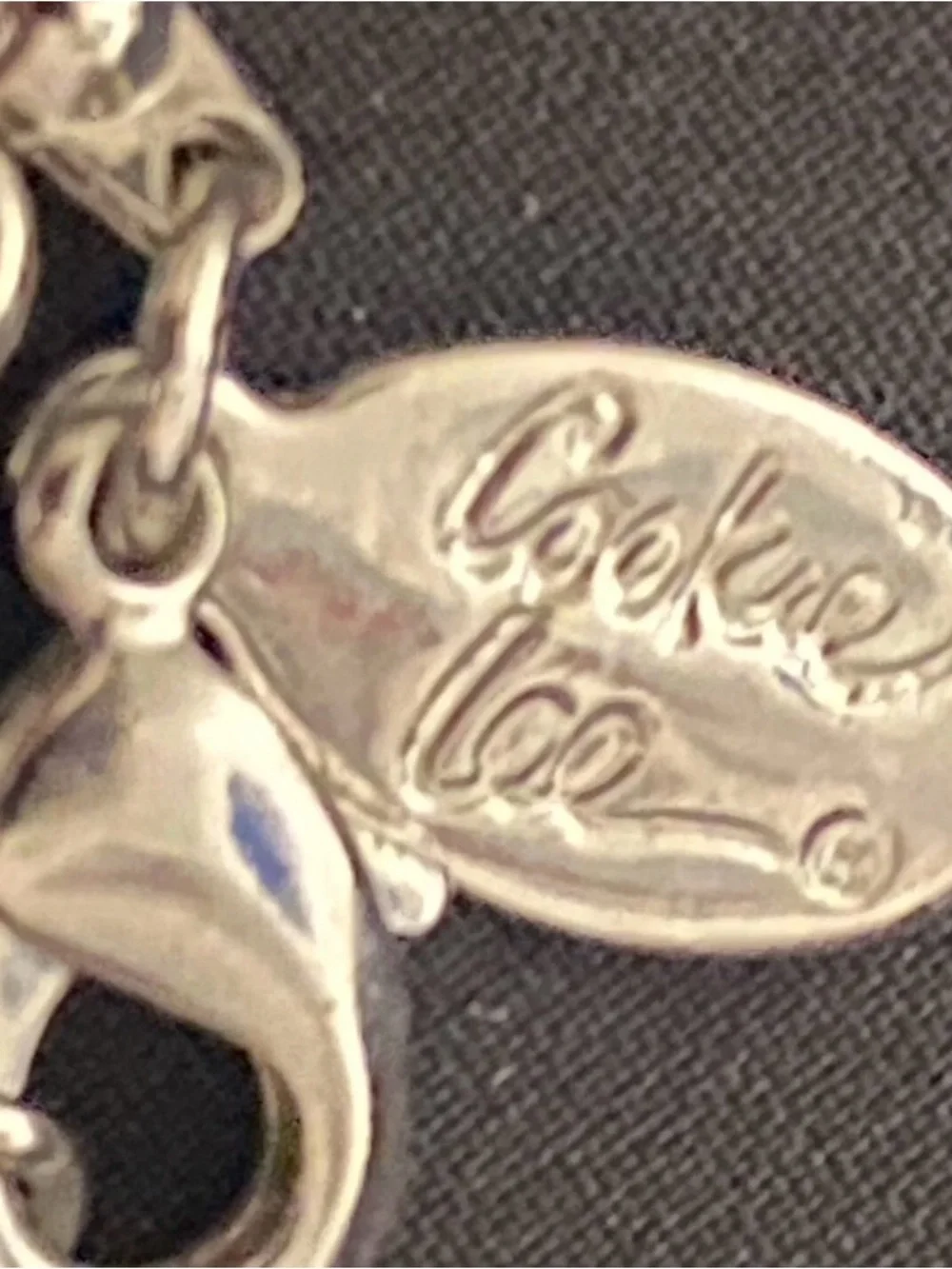 Coach pendant flip